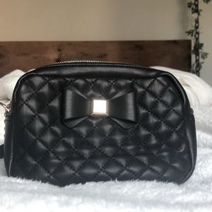 Black leather purse with bow